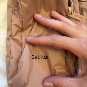 Calpak Water Bottle Holder in Mauve  Beige Travel Organizer